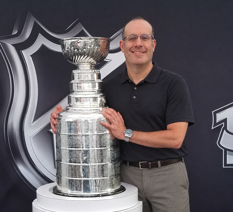 Ian Greengross with the Stanley Cup